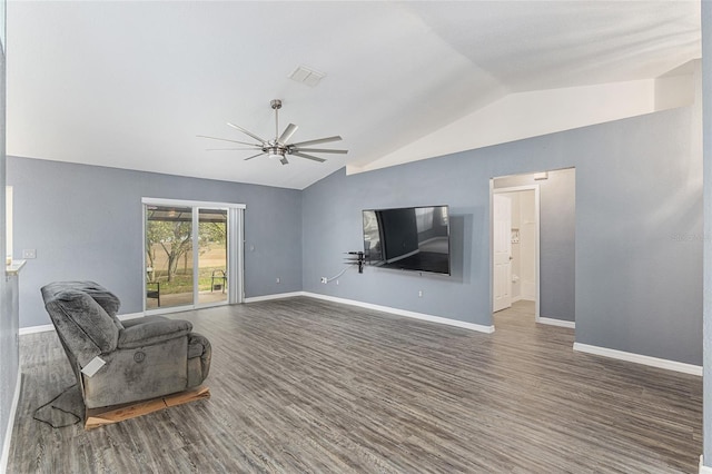 living room featuring ceiling fan, vaulted ceiling, and dark hardwood / wood-style floors