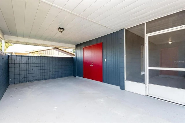 entrance to property featuring a patio area