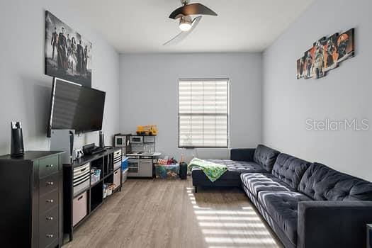 living room with light hardwood / wood-style floors