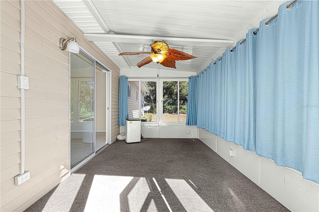 unfurnished sunroom with lofted ceiling with beams and ceiling fan