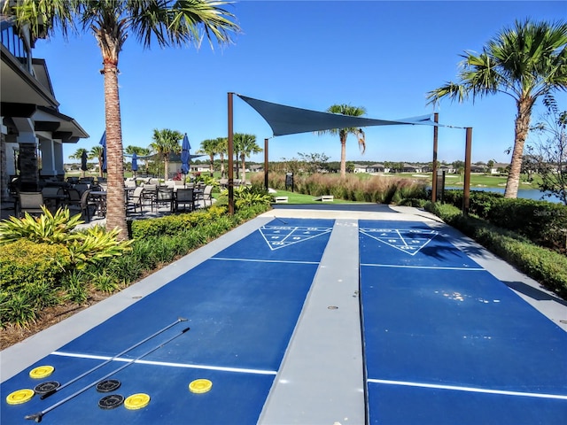 view of home's community with shuffleboard