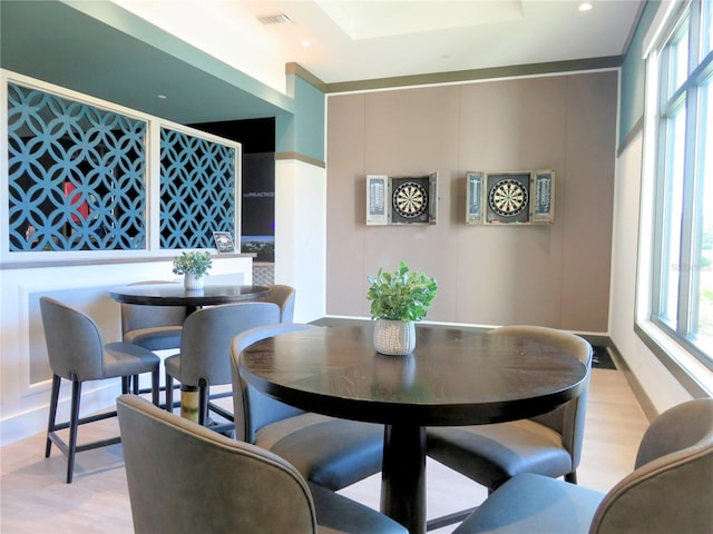 dining area featuring light wood-style flooring, visible vents, and recessed lighting