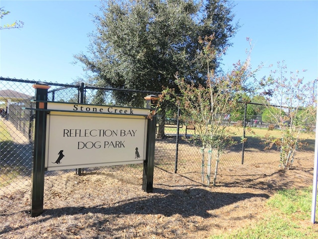 view of property's community with fence