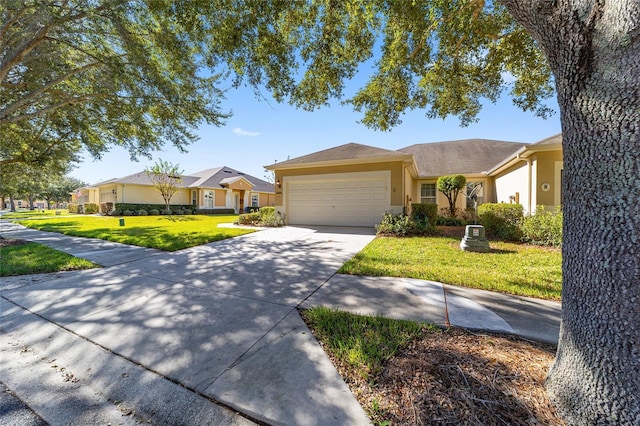 single story home featuring driveway, a garage, a residential view, a front lawn, and stucco siding