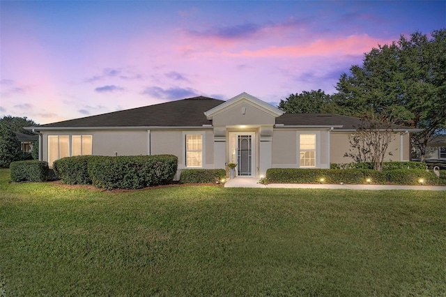 7066 SW 91st Ct, Ocala, FL 34481 - ranch-style home featuring a lawn and stucco siding
