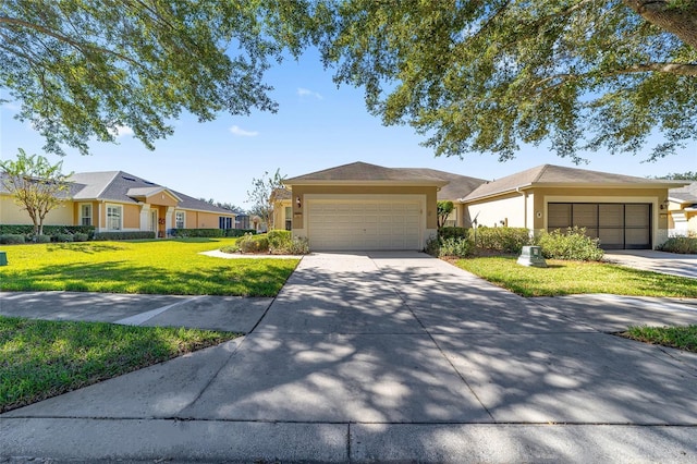 single story home featuring a front lawn and stucco siding