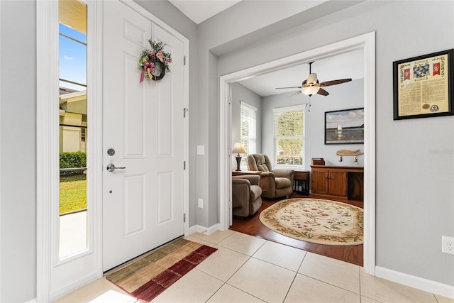 entrance foyer featuring light hardwood / wood-style flooring and ceiling fan