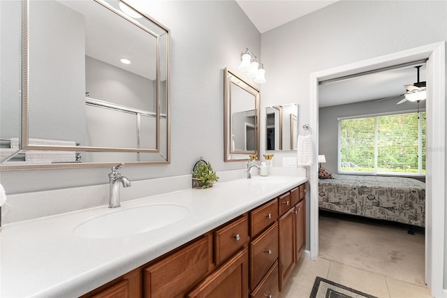 bathroom featuring vanity, tile patterned floors, and ceiling fan