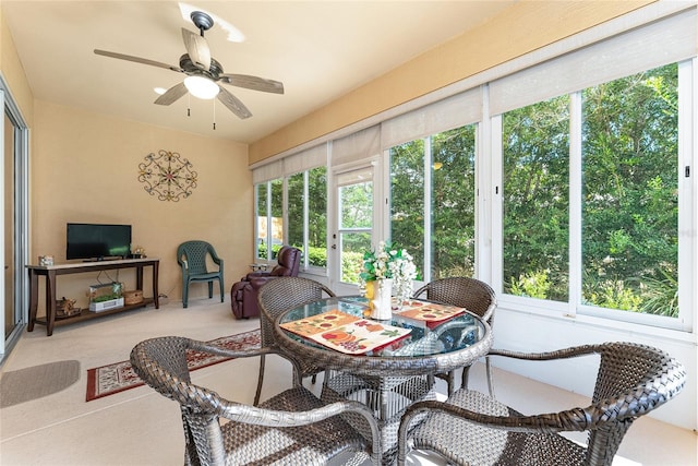 sunroom / solarium with ceiling fan