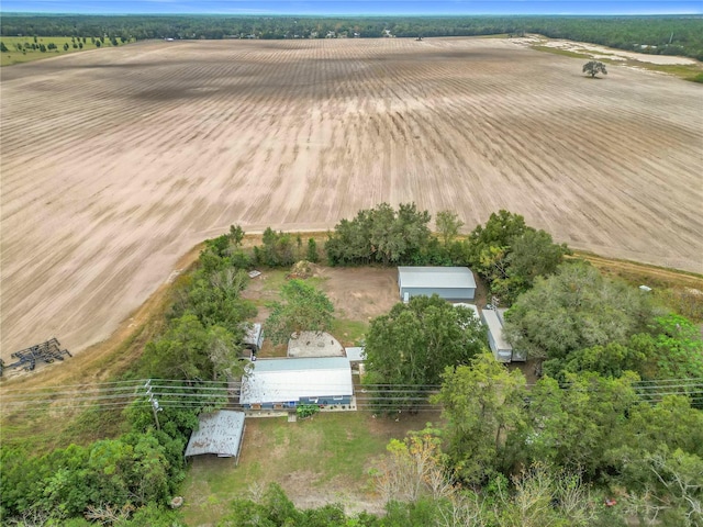 birds eye view of property featuring a rural view