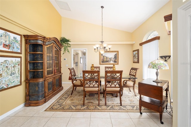 dining room featuring visible vents, vaulted ceiling, an inviting chandelier, and light tile patterned floors