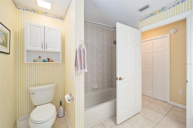 full bath with toilet, tile patterned flooring, visible vents, and baseboards