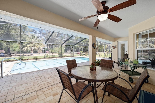 sunroom / solarium with a pool