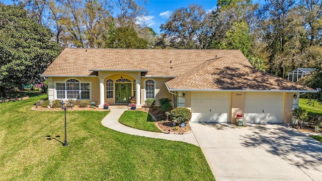 single story home with a garage, a shingled roof, concrete driveway, a front lawn, and stucco siding