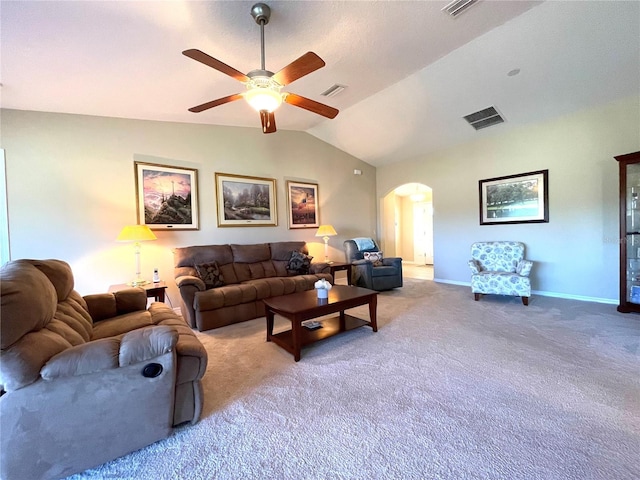 living room featuring carpet flooring, vaulted ceiling, and ceiling fan