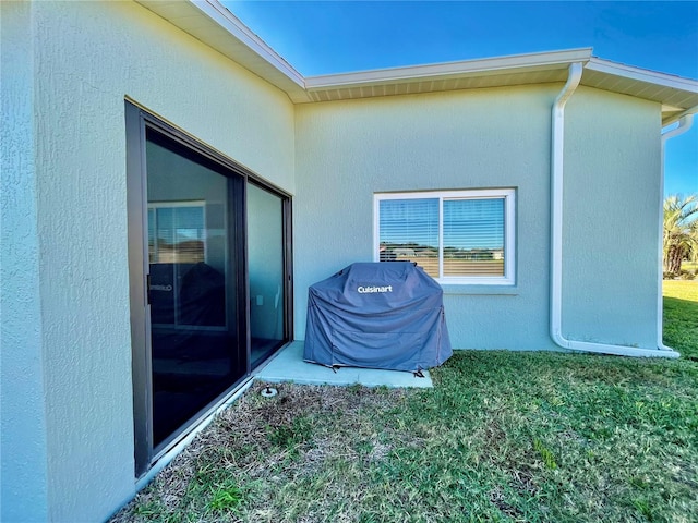 view of home's exterior with a yard