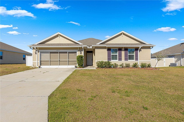 ranch-style home featuring a front yard and a garage