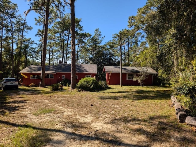 exterior space featuring a yard