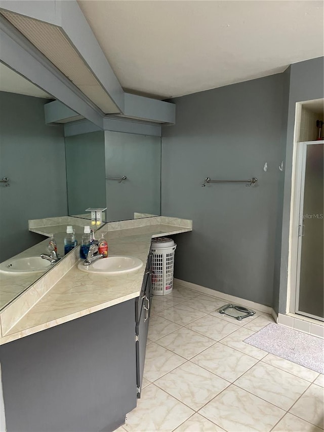 bathroom with vanity and an enclosed shower