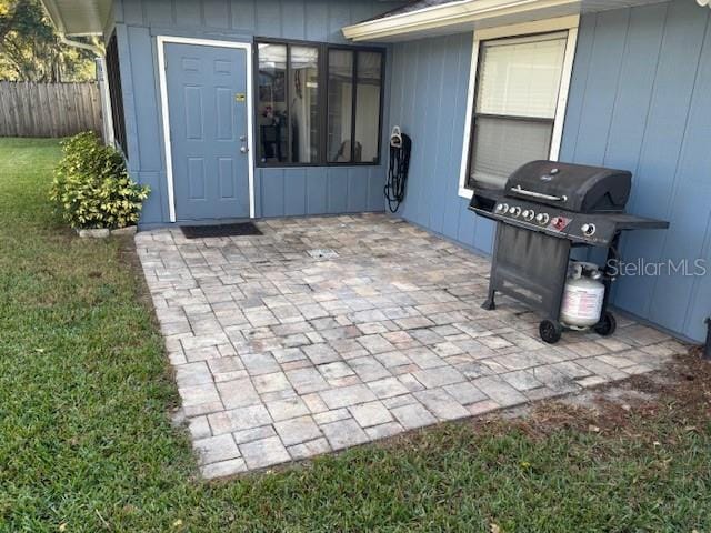 view of patio featuring a grill