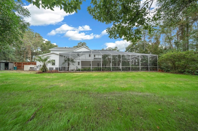 view of yard featuring a lanai