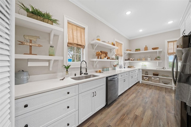 kitchen with open shelves, appliances with stainless steel finishes, crown molding, and a sink