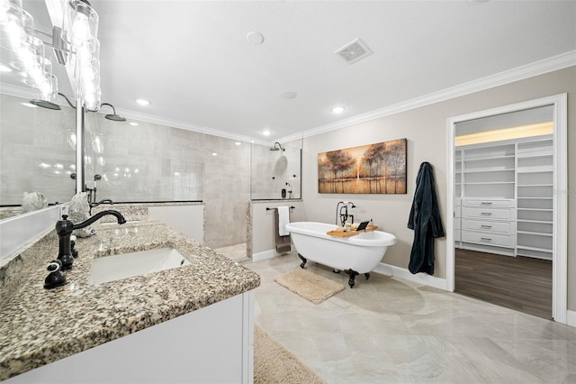 full bathroom with vanity, visible vents, a soaking tub, a walk in shower, and crown molding