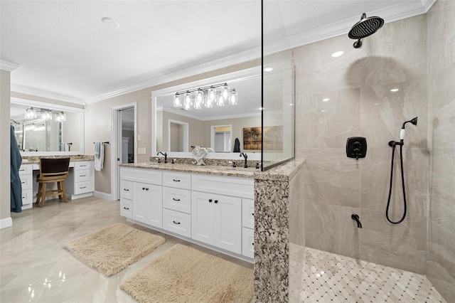 full bath featuring a sink, double vanity, a walk in shower, and ornamental molding