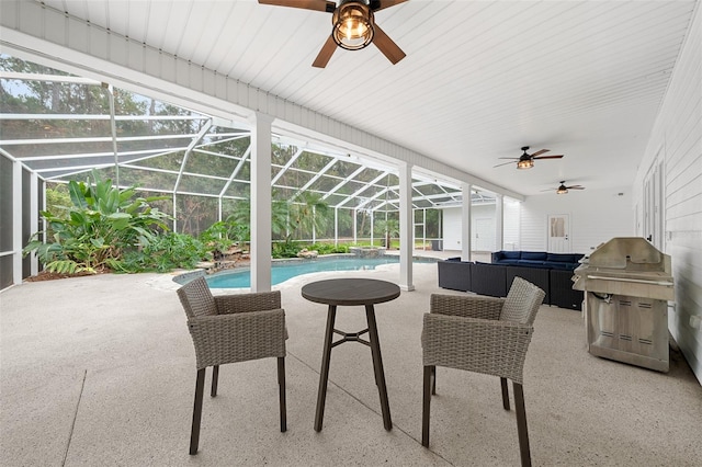 view of patio with a lanai, an outdoor pool, an outdoor hangout area, and ceiling fan