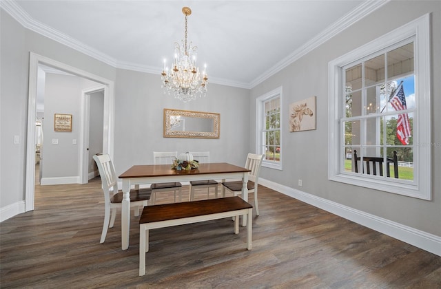 dining room with baseboards, ornamental molding, and dark wood-style flooring