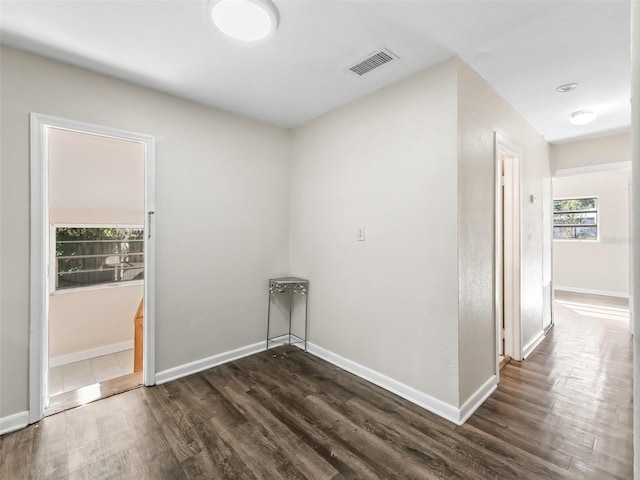 interior space with dark hardwood / wood-style flooring