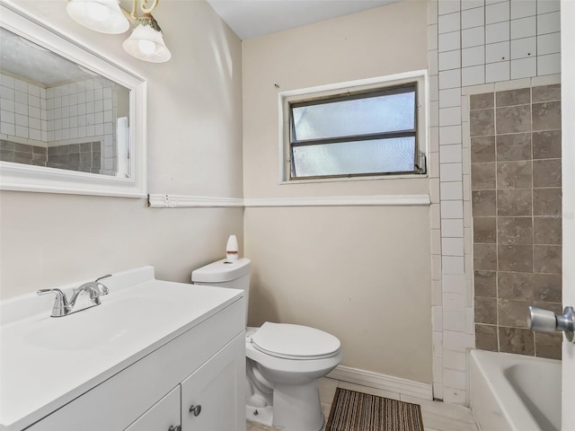 full bathroom with tile patterned flooring, vanity, toilet, and tiled shower / bath