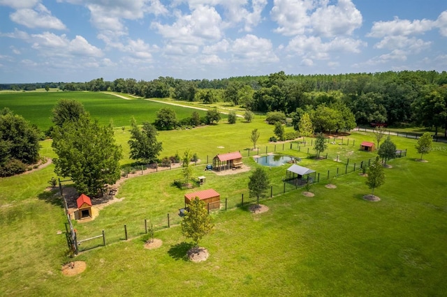 birds eye view of property with a rural view