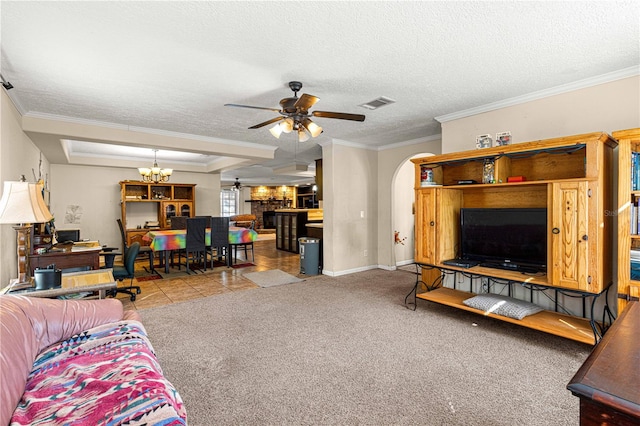 carpeted living room featuring a textured ceiling, ceiling fan with notable chandelier, and crown molding