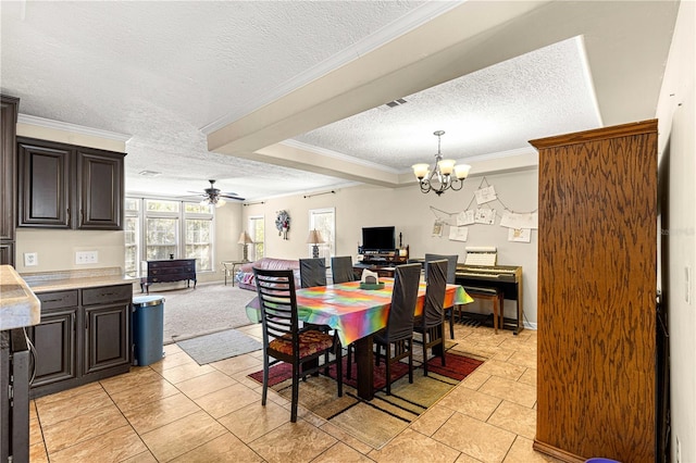 tiled dining space with ceiling fan with notable chandelier, crown molding, and a textured ceiling