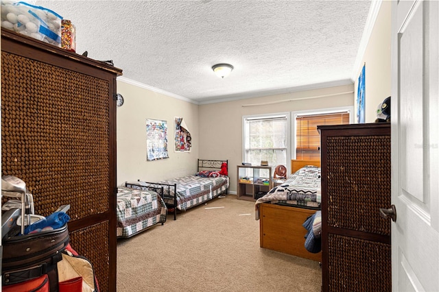 bedroom with carpet flooring, a textured ceiling, and crown molding