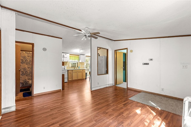 unfurnished living room with hardwood / wood-style floors, a textured ceiling, ceiling fan, and crown molding