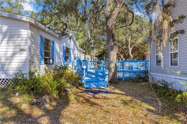 view of yard featuring a deck