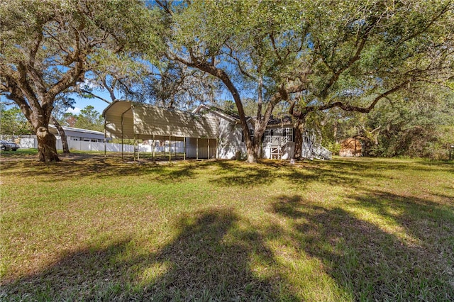 view of yard featuring a carport