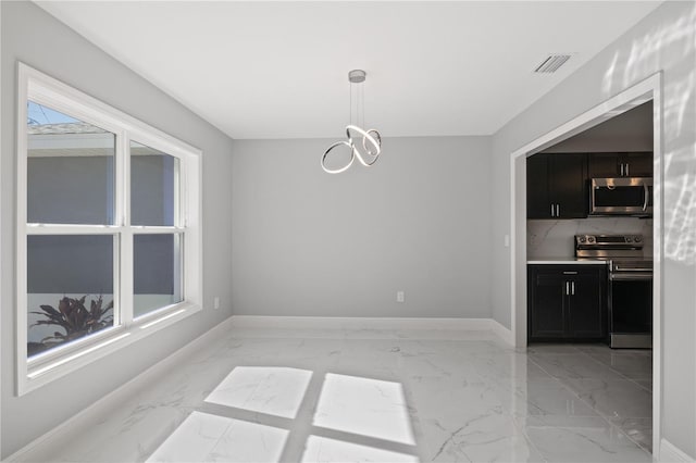 dining room with an inviting chandelier