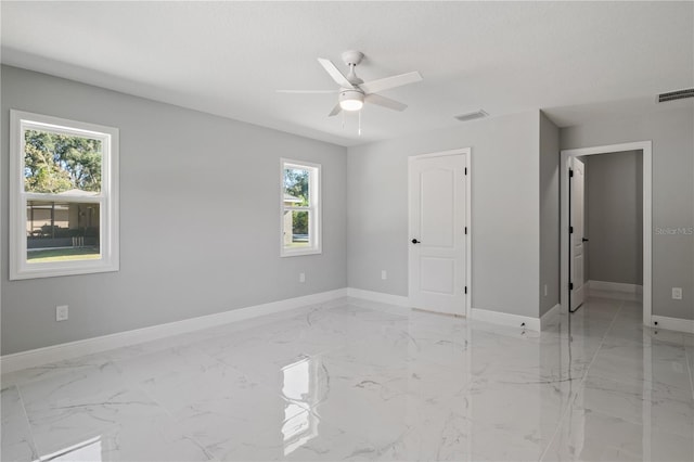 unfurnished bedroom featuring a closet and ceiling fan