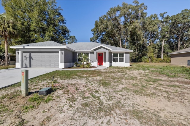 ranch-style home with a garage