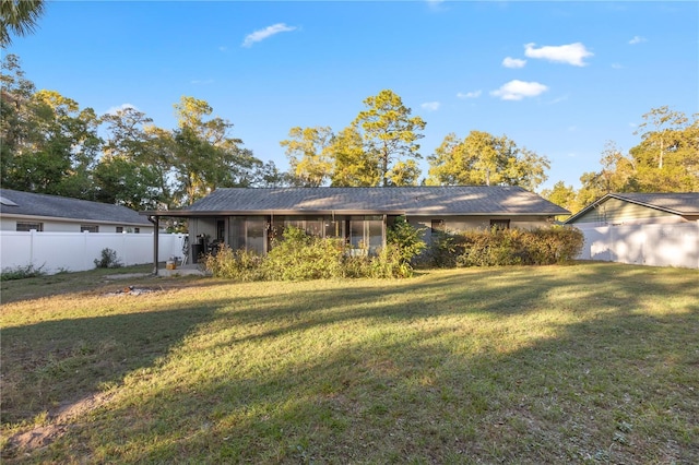 single story home featuring a front yard