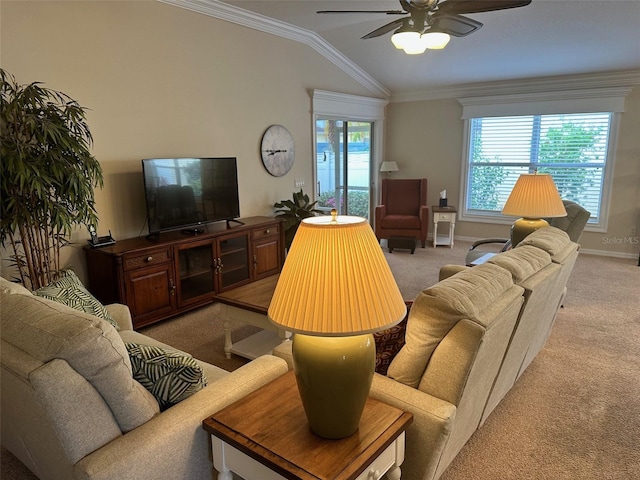 carpeted living room featuring crown molding, plenty of natural light, lofted ceiling, and ceiling fan