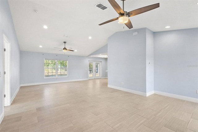 spare room featuring french doors, ceiling fan, and lofted ceiling