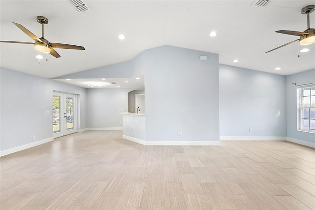 unfurnished living room featuring a healthy amount of sunlight and light hardwood / wood-style floors