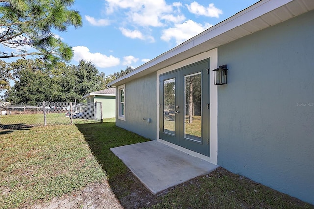 view of yard with french doors