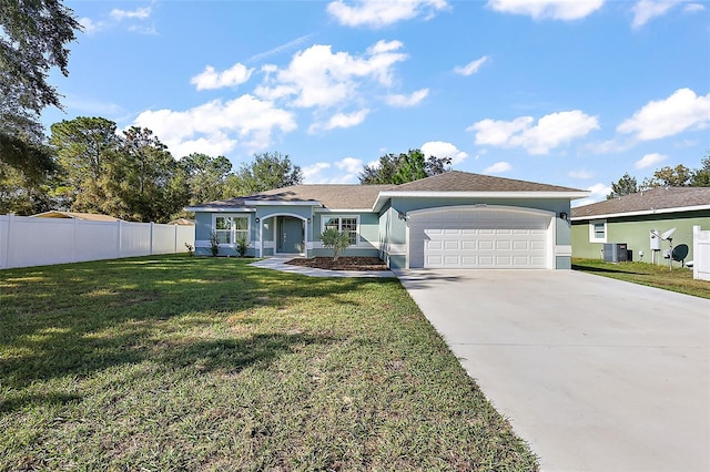 single story home with central AC unit, a garage, and a front lawn