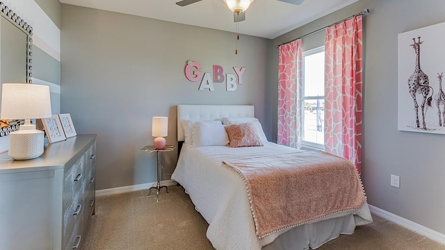 carpeted bedroom with ceiling fan