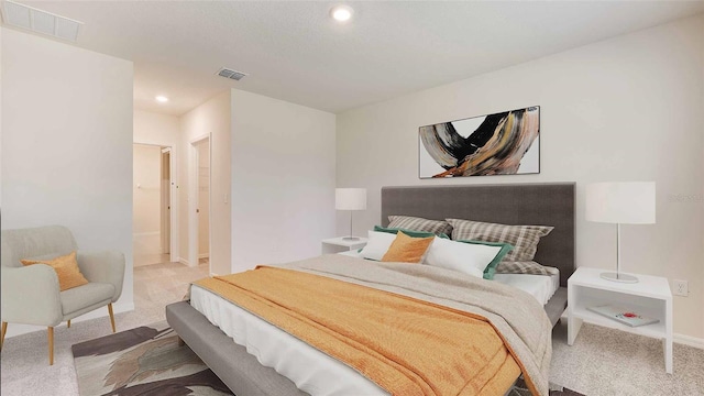 bedroom featuring light colored carpet